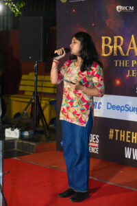 Students performing solo songs during Voice Voyage Brahmastra 2026 annual college cultural festival at RCM